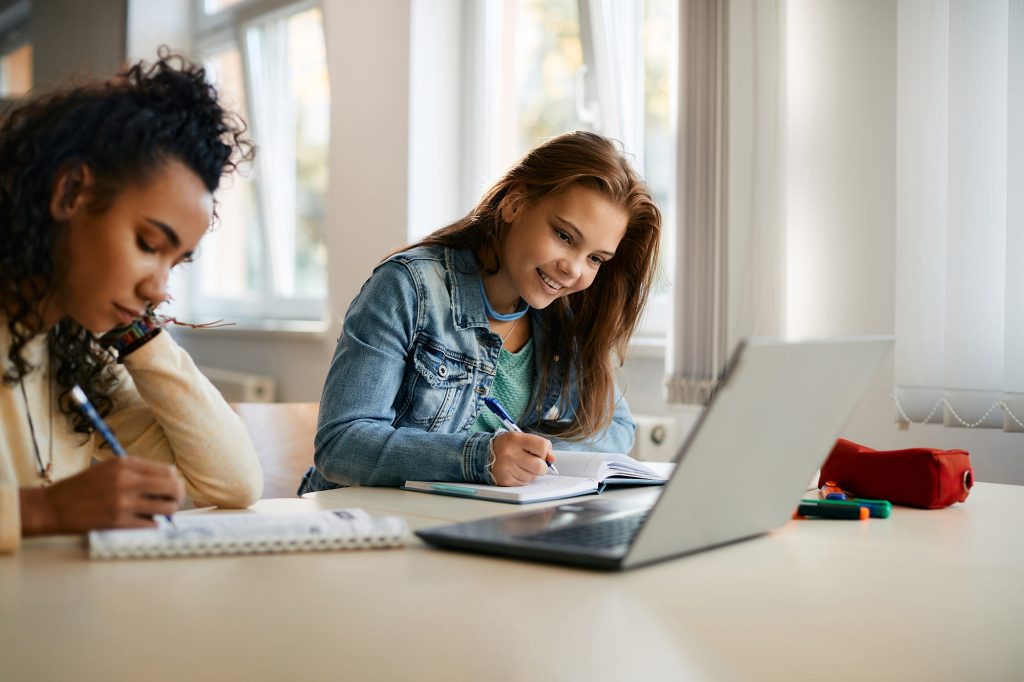 High school students planning homework and study